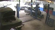 Mechanic Crushed When Dumb Ass Drives Into The Car He's Working On