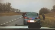 SUV nearly kills a Cop