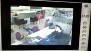 Security guard wounds 2 armed robbers