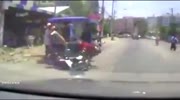 Rider smashes into the rickshaw