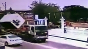 Man Working In Cherry Picker Gets Launched When A Trucks Cargo Clips His Rig