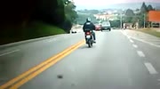 Rider Plows Head On Into An Oncoming Car