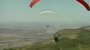 Pilot dies in crash with paraglider.