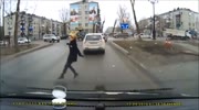 Woman slips and falls under the SUV