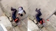 Old Man Knocked Unconscious By Another With A Wooden Stick With Repeated Blows - Two Angles