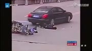 Biker gets hit and run over