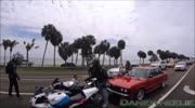 Wife pulls out a pistol to prevent further beating of her man by bikers in road rage video