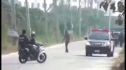 Thai local thug gets rammed by police car