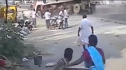 Truck Knocks Pedestrian Down & Crushes Another
