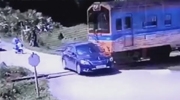 Train Smashes Into A Car Trying To Cross The Tracks