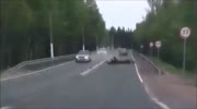 Rider falls and nearly hits the upcoming car