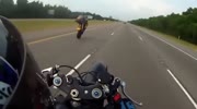 Speeding biker falls while stunt but stay harmless