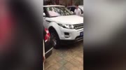 Woman smashes Range Rover into Jaguar blocking her in