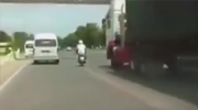 18 Wheeler Runs Over A Careless Scooter Rider