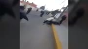 Mexican cop gets his skull crushed with a stone while standoff with illegal taxi drivers