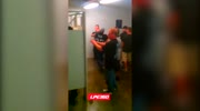 Raiders game bathroom fight.