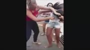 Girl gets new haircut while several bitches beat her