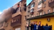 Family Jumps Out Of A Burning Building To A Makeshift Blanket Rescue Team