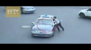 Footage: Runaway taxi drags traffic cop nearly 50 meters