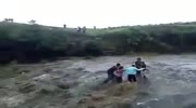 Group of ppl washed away