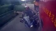 Biker Killed In A Collision With A Truck When The Truck Pulls Into His Lane