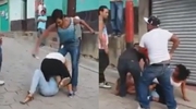 Man Sinks A Knife Into A Woman's Side As She Fights Another Girl