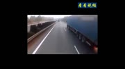 Truck driver dont notice SUV crushed in his trailer