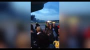 Passengers Watch On as Singapore Airlines Plane Catches Fire on Runway