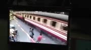 Careless woman gets lightly hit by train