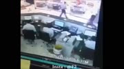 Car crashes a men and breaks into the office