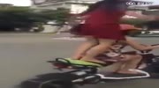 Girls fall from scooter while performing a kind of stunt