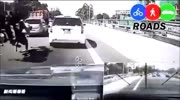 Biker trying to prevent crash makes incredible salto