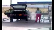 woman washing the car gross.