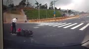 very unlucky guy has motorcycle accident and finally goes to the sewer.