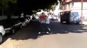 Girl Helps Out Her Man In Street Fight