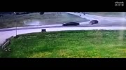 Man gets crushed by car while beating his wife