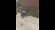 Black bitch gets strong punch after she spits in mans face