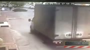 Truck backs up and runs over Oblivious man