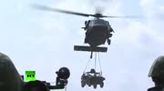 Apache & Black Hawk copters fire with machine guns during Taiwan military drills.