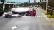 CEMENT TANKER LOSES CONTROL, CRUSHING CAR ON A CROSSROAD