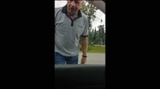 Mentally sick man attacks the car with a metal baton
