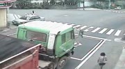 Woman gets run over by truck