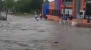 Helpless Man Washed Down Street In Flash Flood