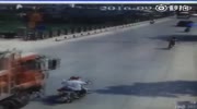 Rider falls head first under the truck