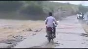 A Daring Biker And The Raging Water