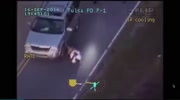 Helicopter view of unarmed black man being killed by police.