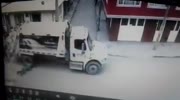 Man is thrown under truck wheel by other car