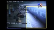 Woman slips between train and platform