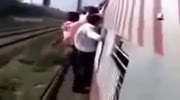 Man falls of from crowded Mumbai local train.