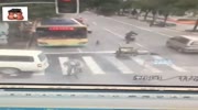 Rider waiting at red light run over by reversing vehicle.